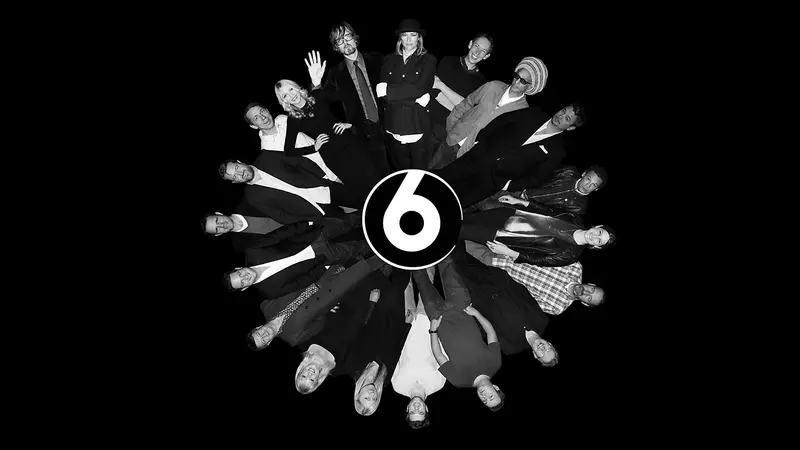 BBC 6 Music presenters in black and white, lying in a circle around a large number 6