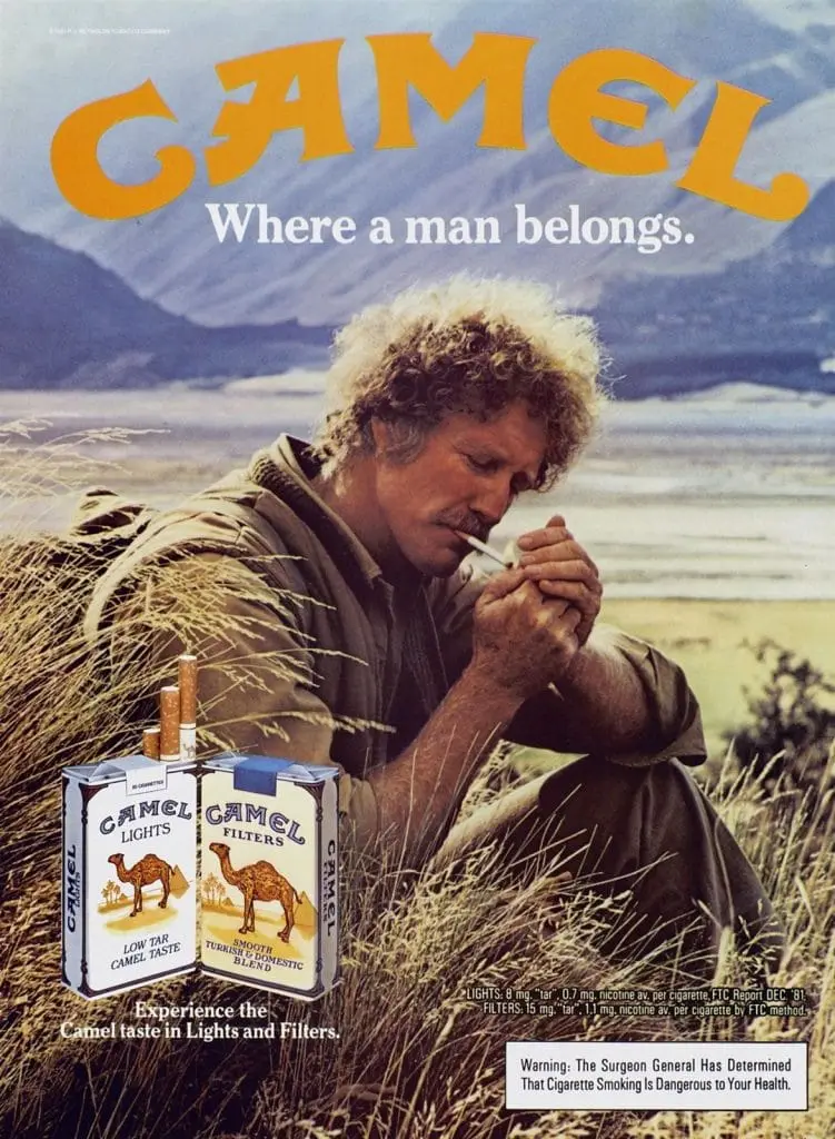 Vintage Camel cigarette ad: a rugged outdoorsman lighting up under the line 'Where a man belongs.'