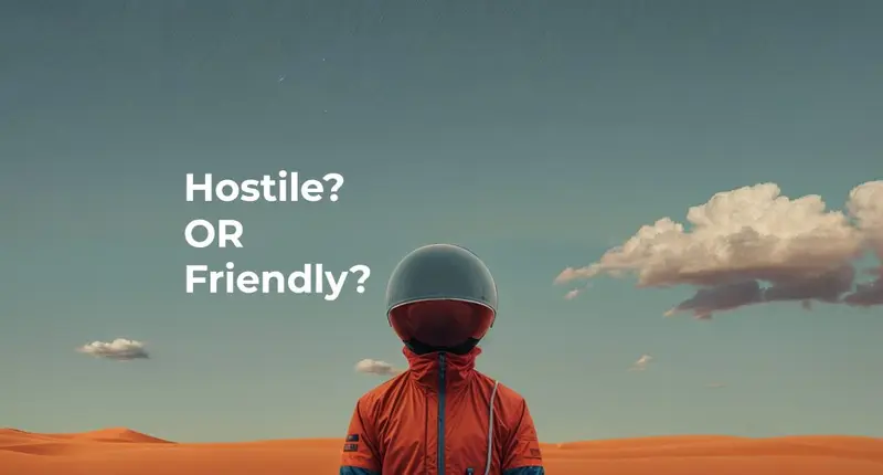 Figure in an orange spacesuit and helmet in a desert under the words 'Hostile? OR Friendly?'