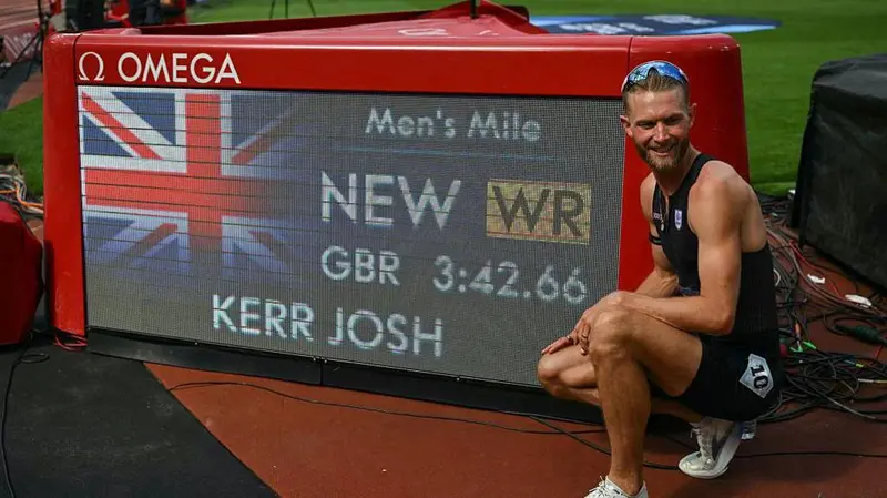 Josh Kerr celebrates after setting the mile world record of 3 minutes 42.66 seconds in London in 2026.